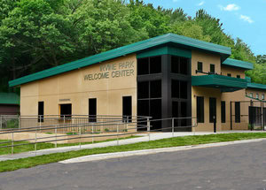 Modern Crescendo Consulting Office Building At Live Park Welcome Center With Greenery Background.