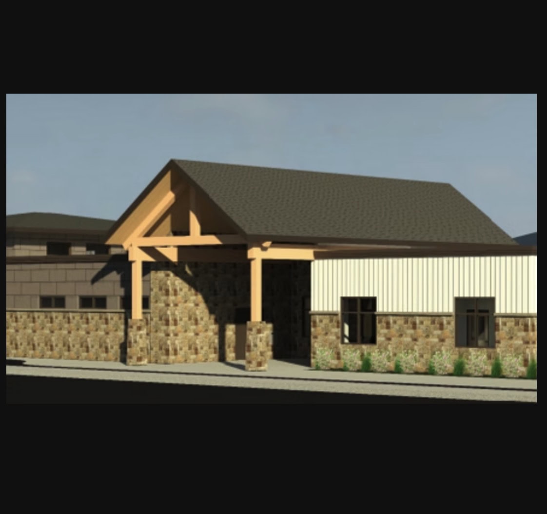 Luxury Commercial Building With Stone And Metal Facade, Designed By Crescendo Consulting.